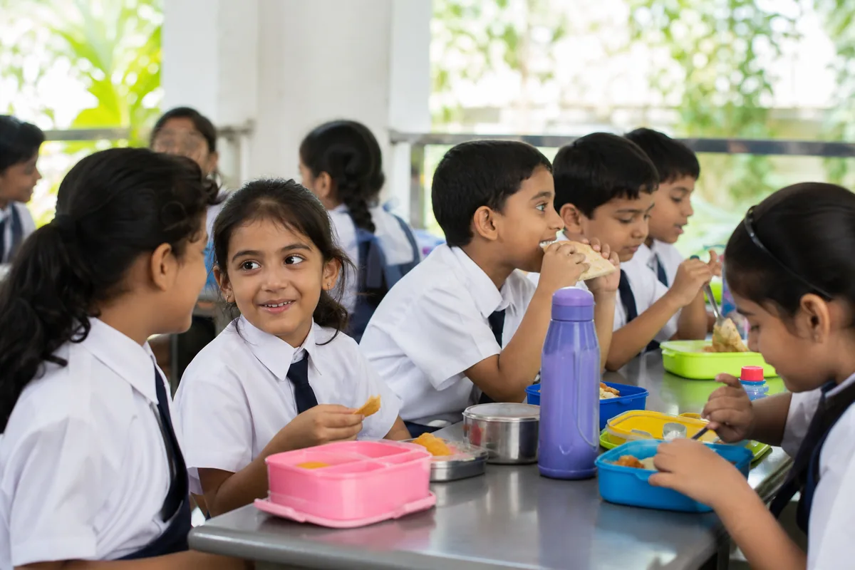 Indian student eating a nutritious school lunch